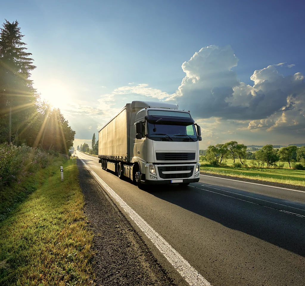 Freight truck driving on a rural highway